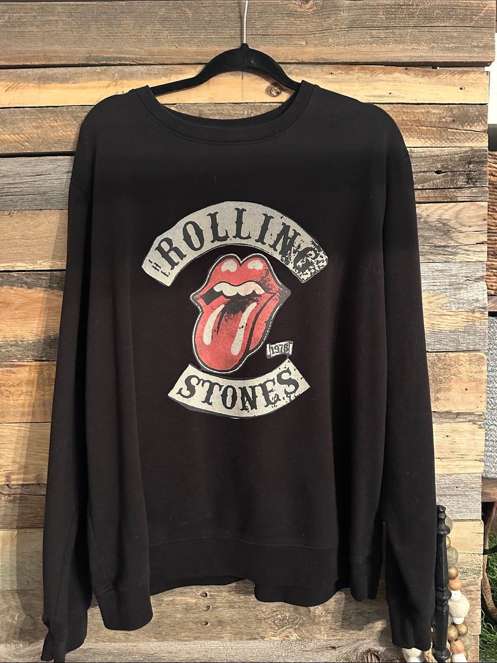 the Rolling Stones Black Crewneck with Red Tongue Graphic